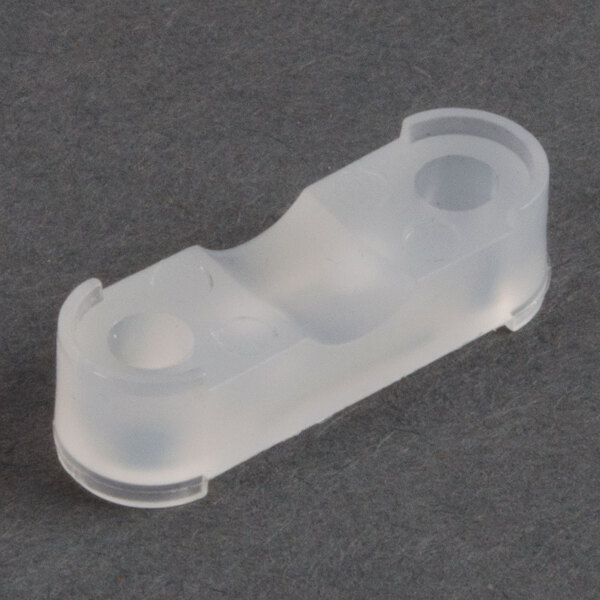 A white plastic Waring cord clamp with two holes.