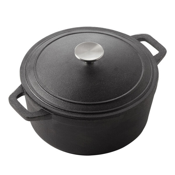 An American Metalcraft black cast iron Dutch oven with a lid.