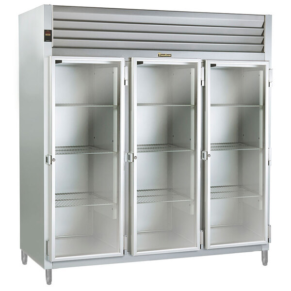 A white Traulsen pass-through heated holding cabinet with glass doors.