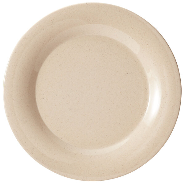 A white plate with speckled bamboo edges.