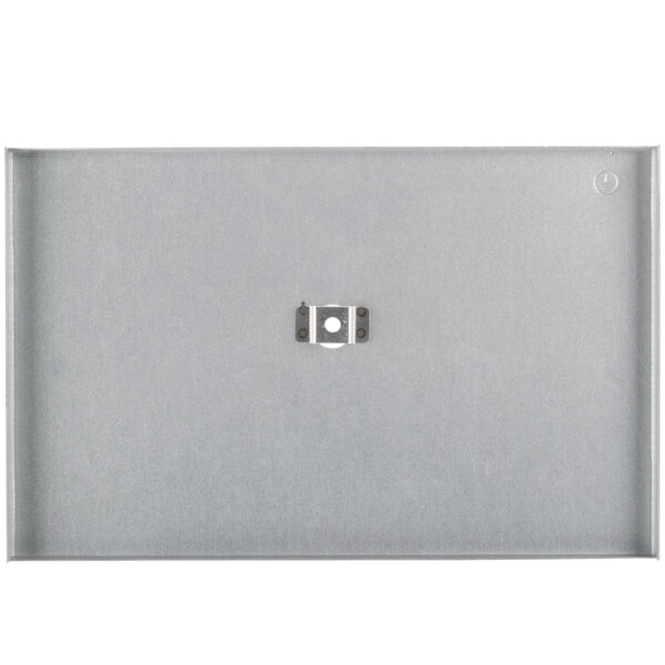 A rectangular metal plate with a hole in the middle.