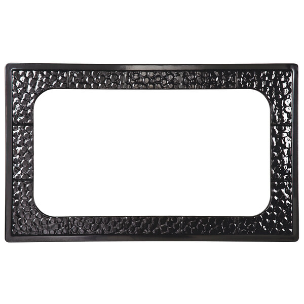 A black rectangular melamine plate with a square cut-out for a casserole dish.