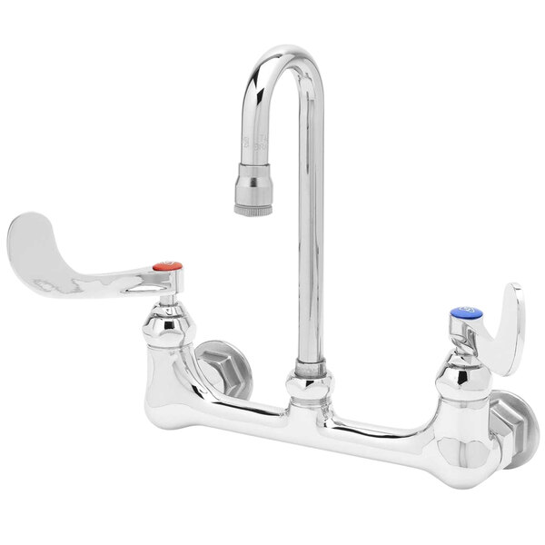 A silver T&S wall mount faucet with two wrist action handles with red and blue accents.