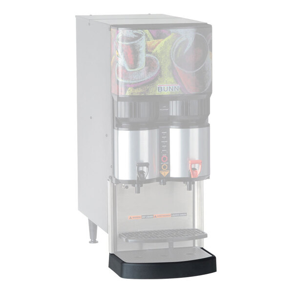 A Bunn drip tray for coffee dispensers under a machine with a cup holder.