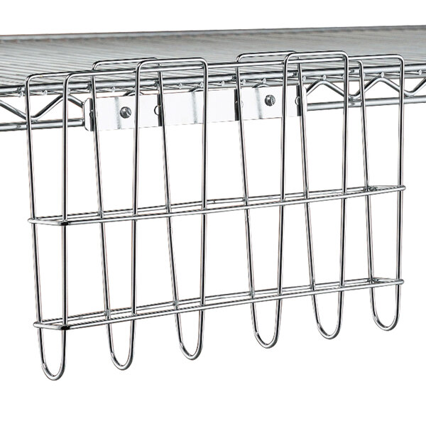 A close-up of a Metro chrome file basket on a wire rack.