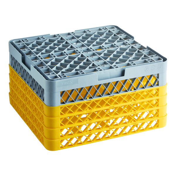 A gray full-size glass rack with four yellow extenders, designed for warewashing and holding 16 compartments.