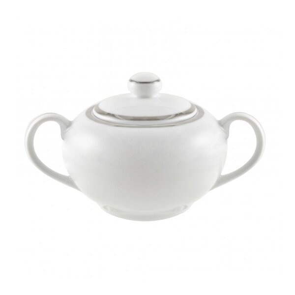 A white porcelain covered sugar bowl with silver trim and a handle.