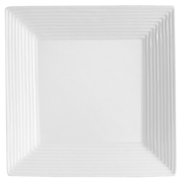 A white square porcelain plate with black lines forming a square center.