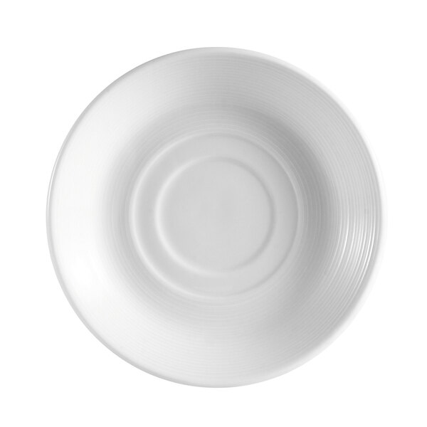 A CAC Harmony white porcelain saucer with a circular pattern on the rim.