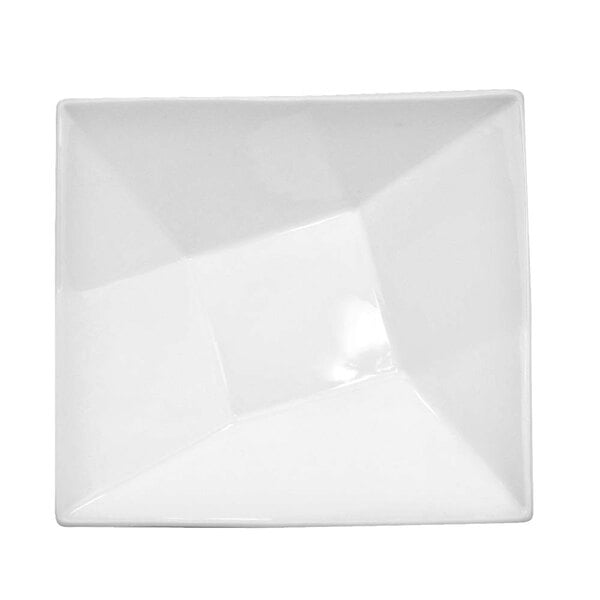 A white square porcelain bowl with a shadow on a white background.