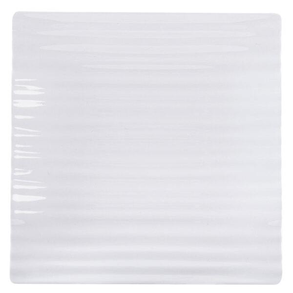 A white square Polynesian melamine plate with wavy lines.