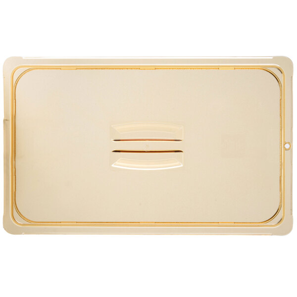 A white rectangular plastic lid with a handle and a rectangular hole in the middle.