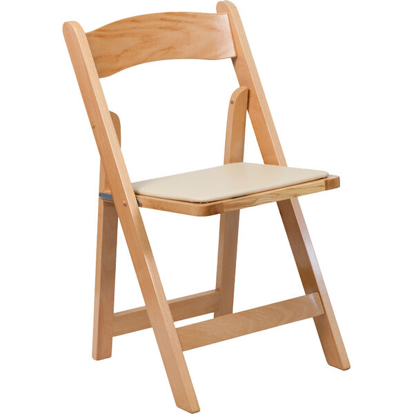 A Flash Furniture natural wood folding chair with a white padded seat.