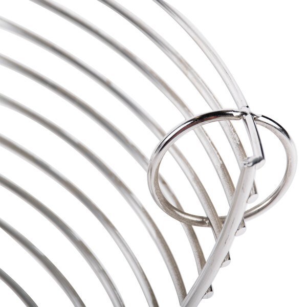 A close-up of a stainless steel bowl guard for an Avantco mixer.