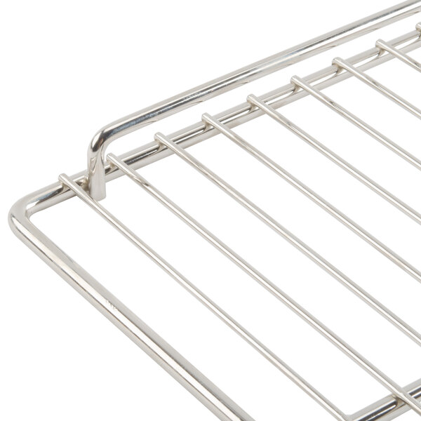 An Avantco stainless steel wire rack with a handle.
