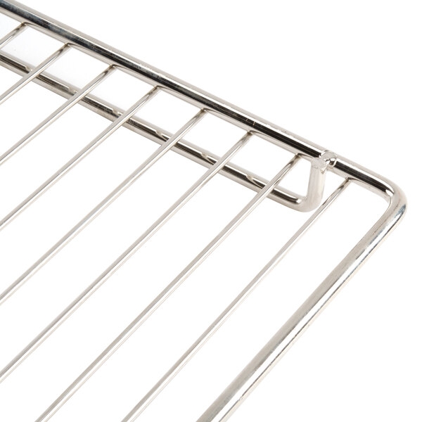 A close up of a stainless steel Avantco middle rack.