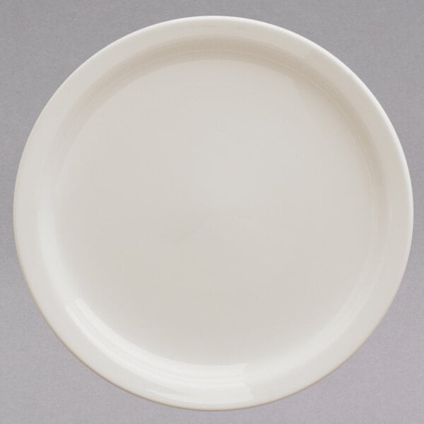 A white Homer Laughlin narrow rim china plate.