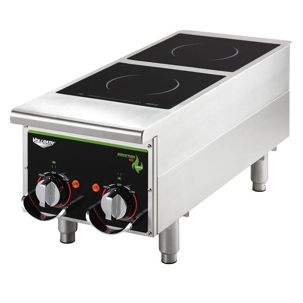 A Vollrath stainless steel dual induction hot plate on a countertop.