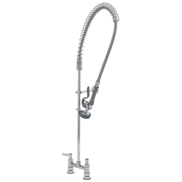 A chrome T&S deck mounted pre-rinse faucet with a hose.