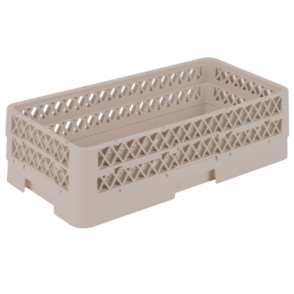 A beige plastic Vollrath Traex dish rack with holes.