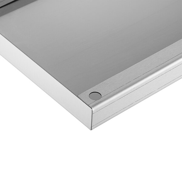 A Regency stainless steel sliding lid for an underbar ice bin.
