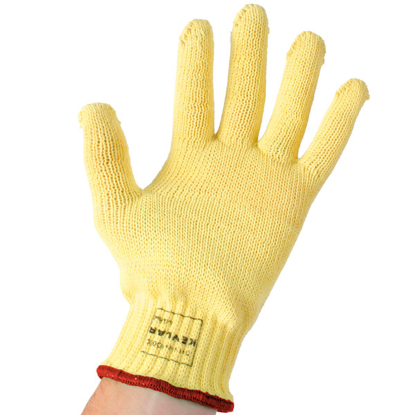 A yellow Cordova cut resistant glove with a red wristband.