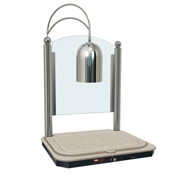 A Hatco carving station with a lamp on a Bermuda Sand-colored base and bright nickel finish.