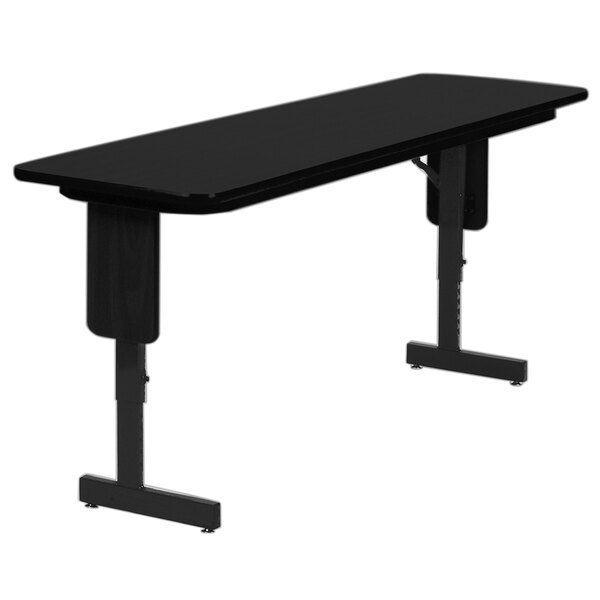A black rectangular Correll seminar table with panel legs.