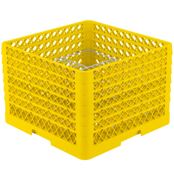 A yellow Vollrath Traex Plate Crate with compartments for holding plates.