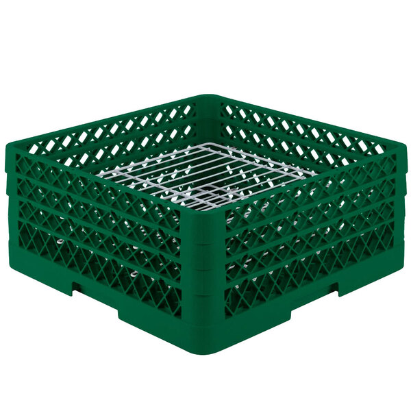 A green plastic Vollrath Traex Plate Crate with metal dividers.