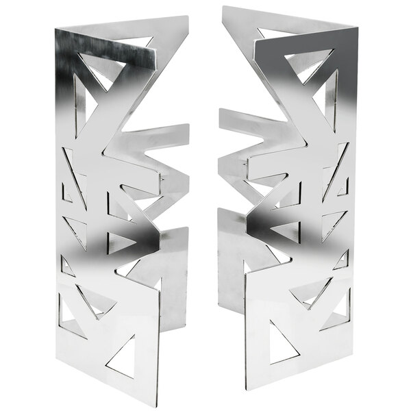Two silver metal Eastern Tabletop L shaped display risers with geometric designs.
