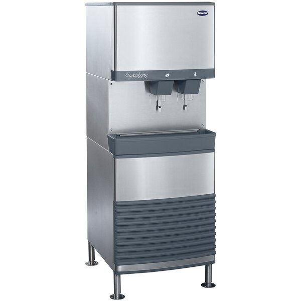 A silver and black Follett 110 FB Series freestanding water cooled ice machine with water dispensers.