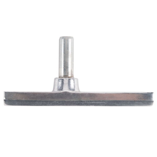 A close-up of a metal cylinder with a small hole on top.