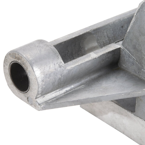 An Avantco towing bracket for a meat slicer with a hole in it.