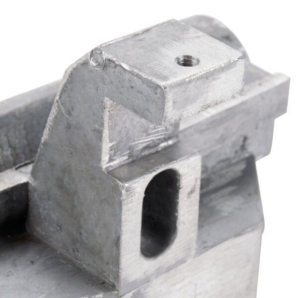 An Avantco towing bracket with a small hole in it.