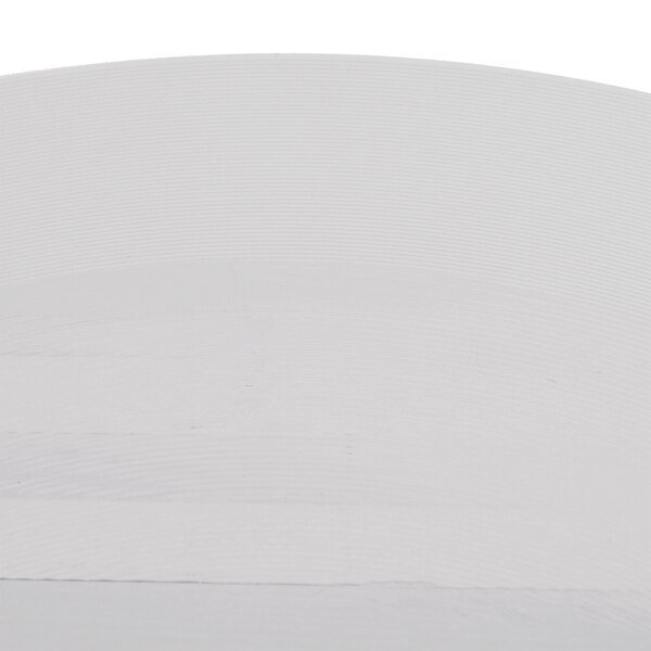 A white surface with a curved edge and a few lines.