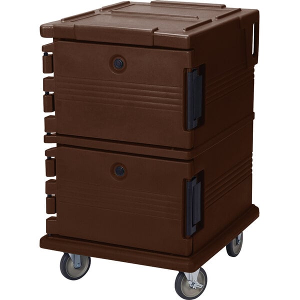 A dark brown Cambro food pan carrier on wheels with a black handle.