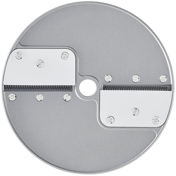 A circular metal Robot Coupe Julienne cutting disc with two holes in it.