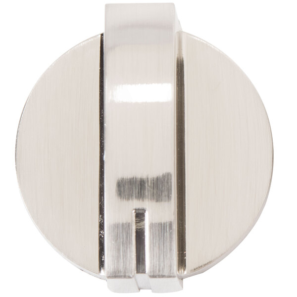 A close-up of a stainless steel Avantco temperature control knob with a white background.