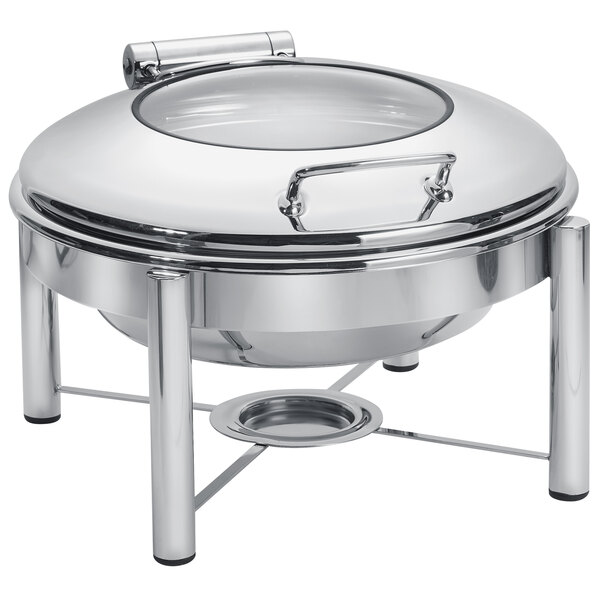 A round stainless steel Eastern Tabletop chafer with glass lid on a stand.