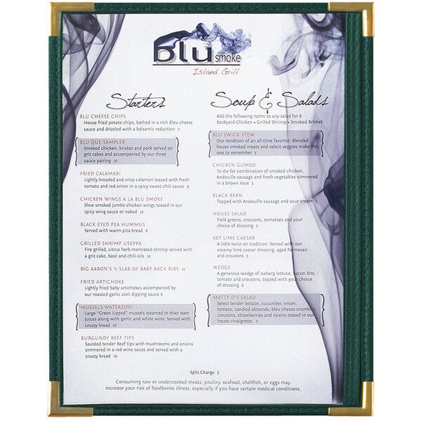 A green Menu Solutions menu board with gold corners holding a menu.