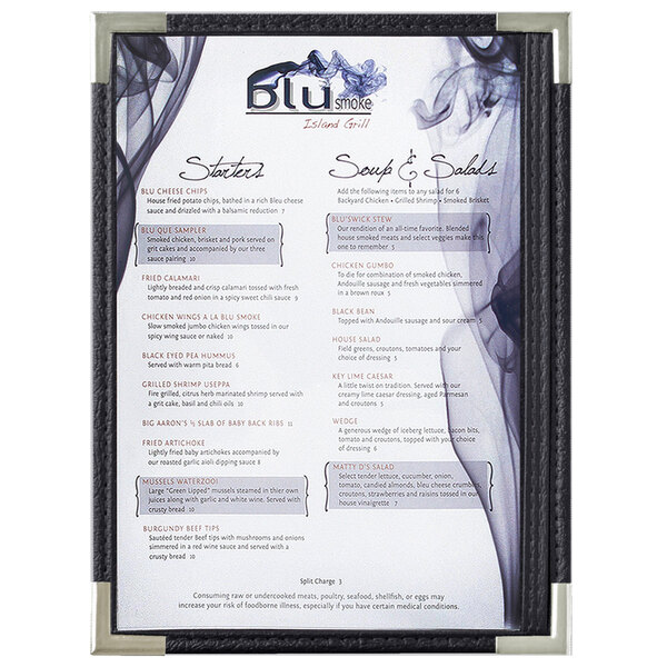 A Menu Solutions black menu board with silver corners holding a menu with white pages.
