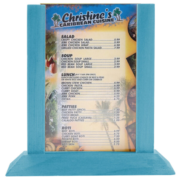A blue table tent with a wood border holding a menu on a table.