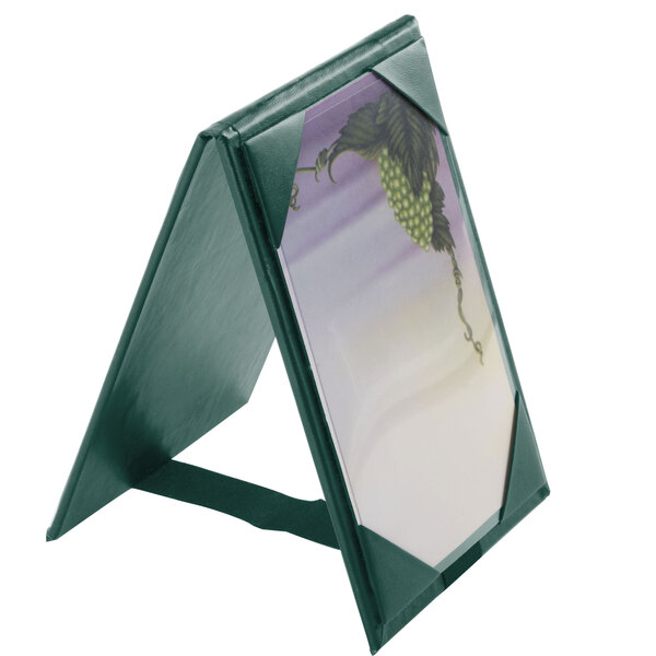A green Menu Solutions table tent frame with picture corners.
