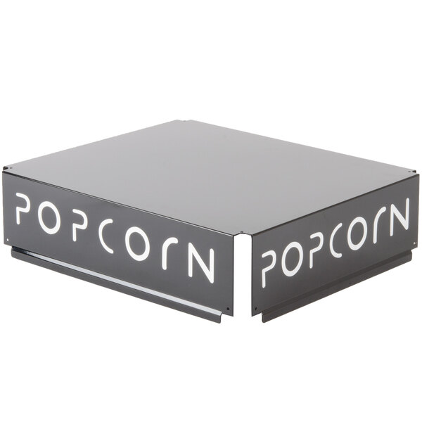 A black replacement top for a Paragon popcorn popper with white text that says "popcorn" on it.