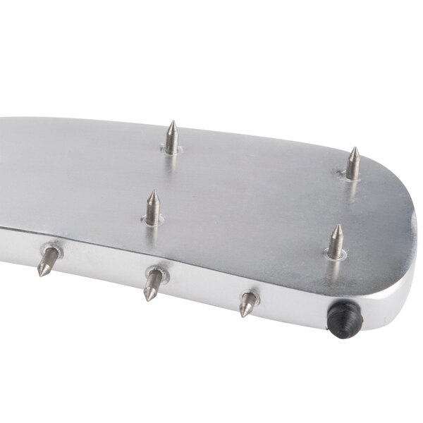 A silver metal plate with spikes on it, the Avantco 177SL309ARM Replacement Pusher Arm for SL309.