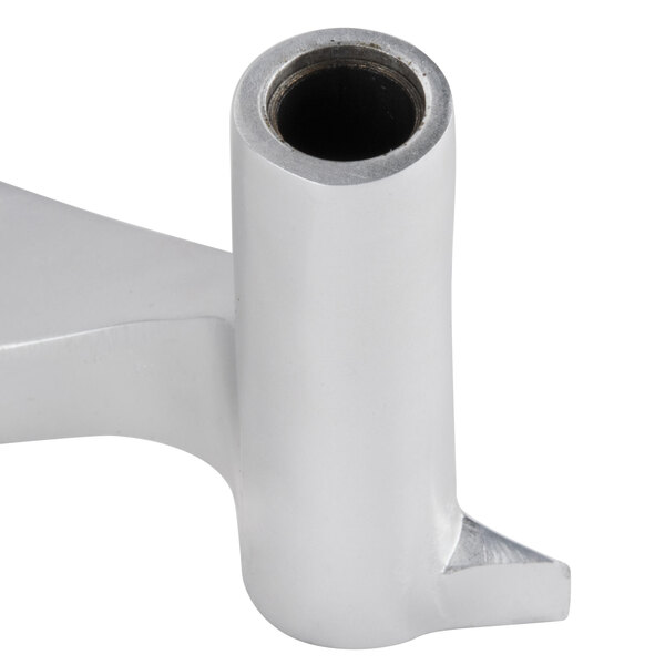 A close-up of a silver Avantco pusher arm with a hole in it.