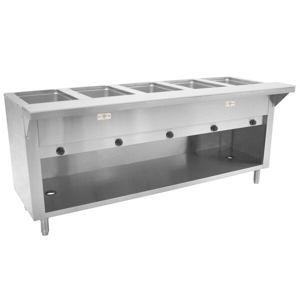 An Advance Tabco stainless steel hot food table with an open well and enclosed base holding five pans.