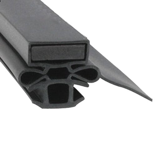 A close-up of a black rubber strip with two holes.