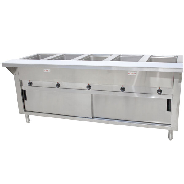 An Advance Tabco stainless steel hot food table for five pans with enclosed sliding doors.